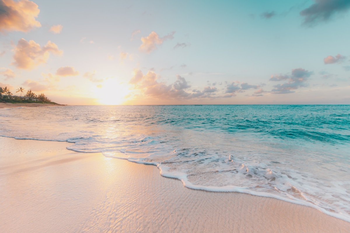 Tropical beach sunset with turquoise water